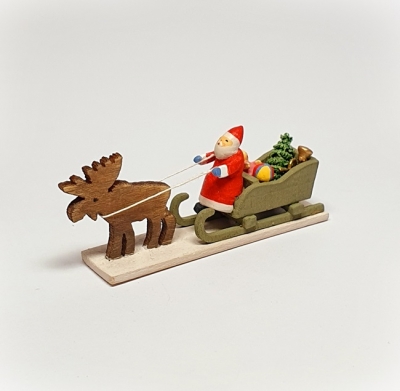 Weihnachtsmann mit Schlitten und Elch