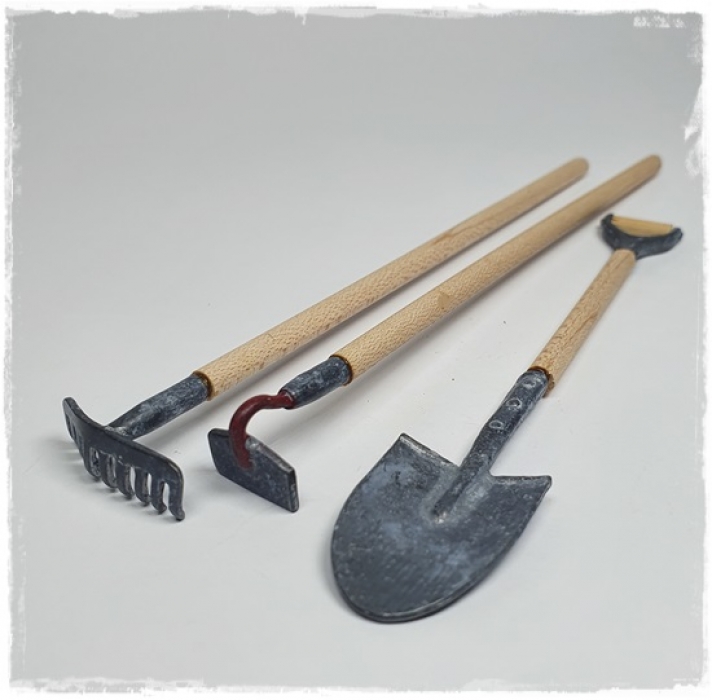 Garden tools rake spade and hoe