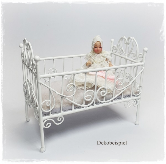 white metal cot
