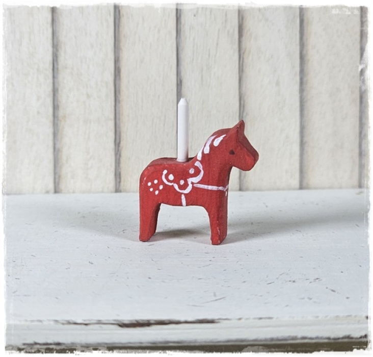 Dala horse with candle