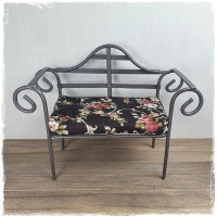 Brown metal garden bench