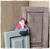 Kantenhocker Zwerg mit Kerze